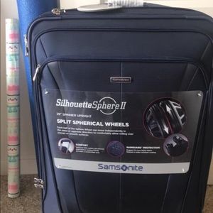 NEVER USED SAMSONITE SUITCASE